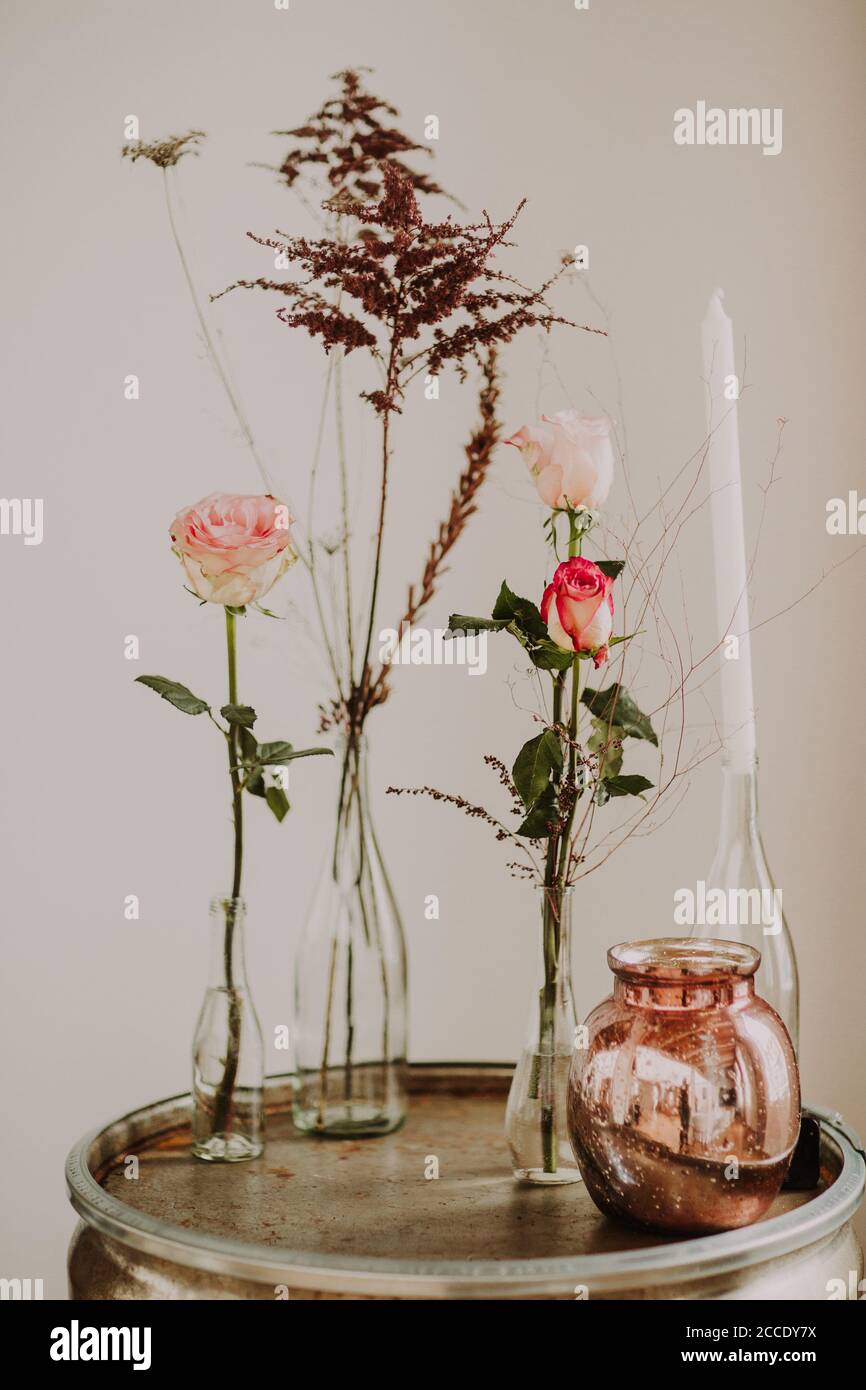 Decoration, flower vases, grasses, side table Stock Photo