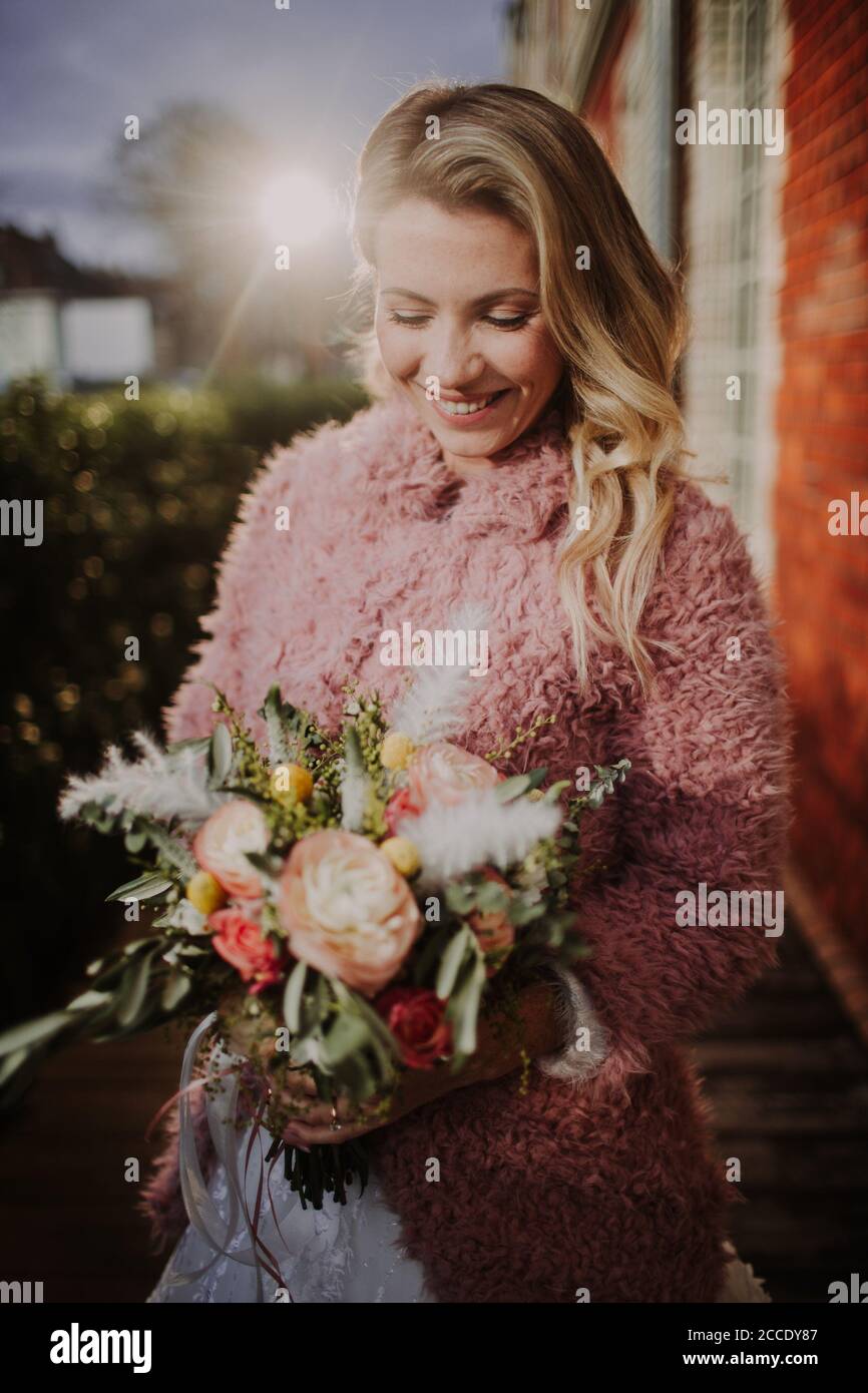 Happy smiling bride flower hi-res stock photography and images - Alamy
