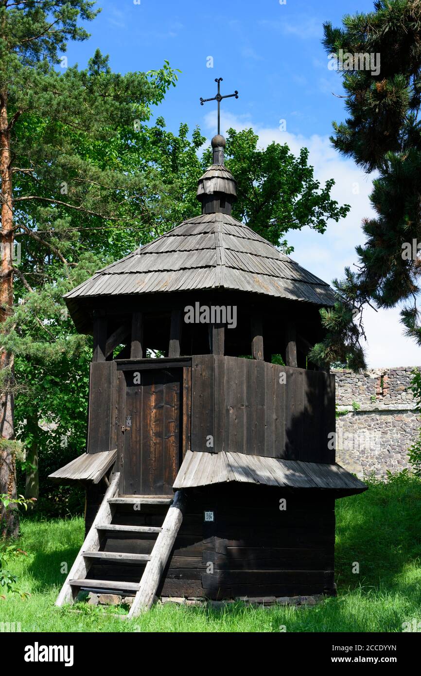 Uzhhorod, Ungwar, Museum of Folk Architecture and Life, bell tower, from village across Zakarpattia (Carpathian Mountains) in Transcarpathian Oblast, Stock Photo