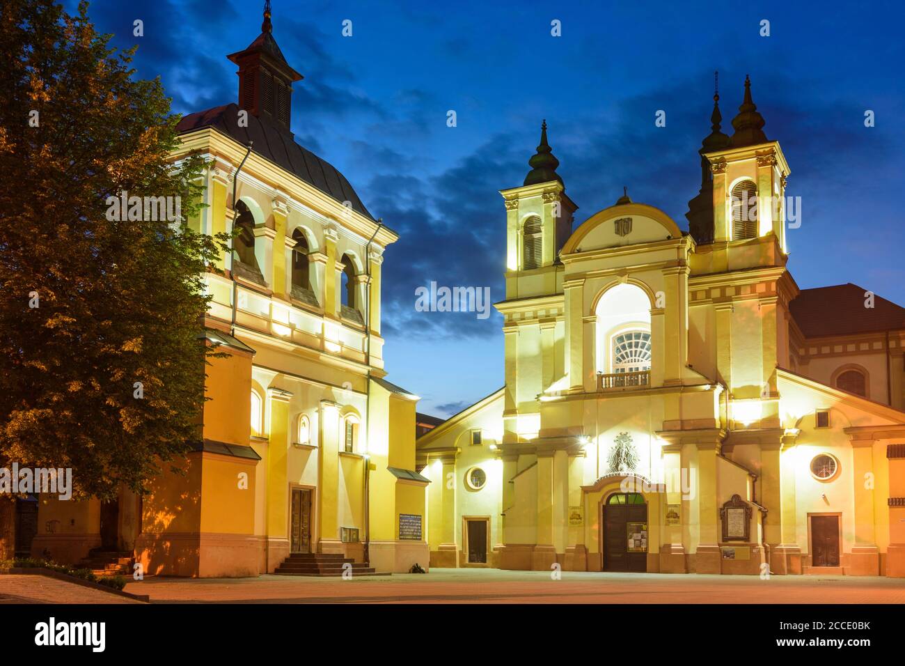 Ivano-Frankivsk, Collegiate (left), Precarpathian Art Museum (former Parish Church of Virgin Mary), Sheptytsky Square in Ivano-Frankivsk Oblast, Ukrai Stock Photo
