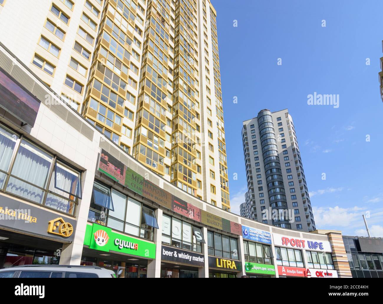 https://c8.alamy.com/comp/2CCE4KH/kiev-kyiv-highrise-apartment-building-newly-built-quarters-residential-highrise-south-of-kiev-shops-in-kyiv-ukraine-2CCE4KH.jpg