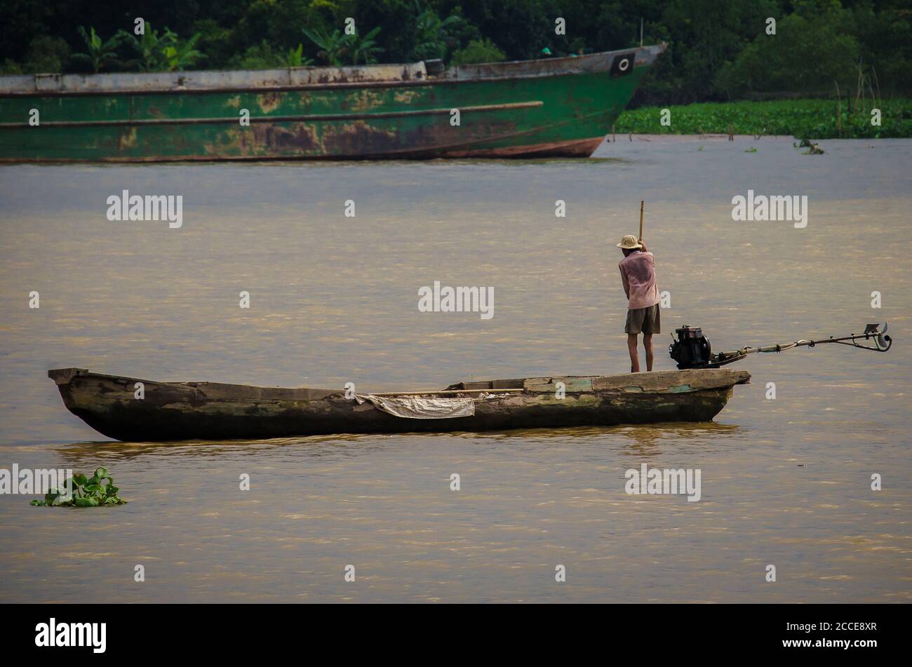 Fisherman on the Mekong river Stock Photo - Alamy