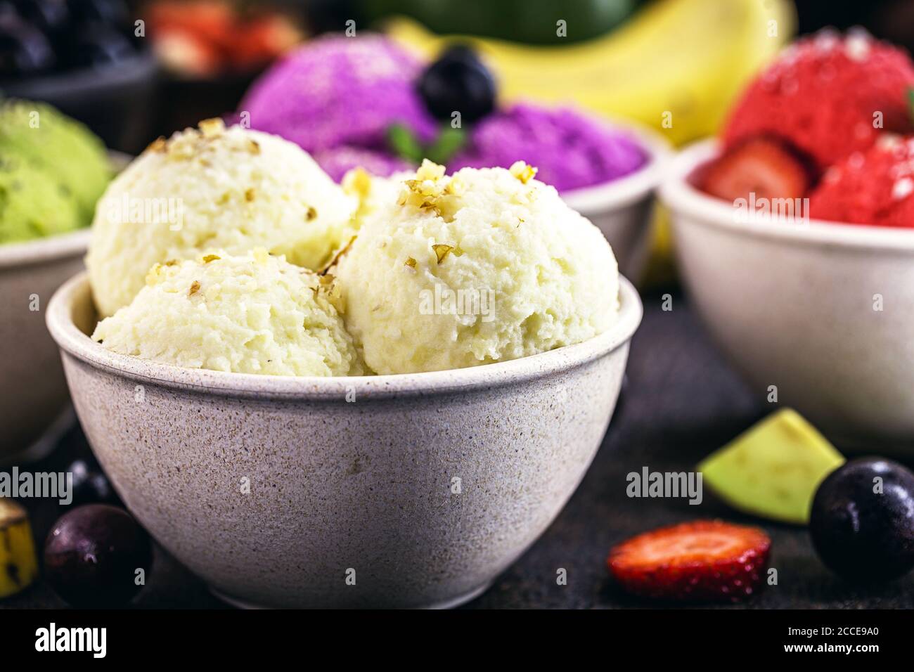 vegan banana ice cream made with frozen bananas and tropical fruits in