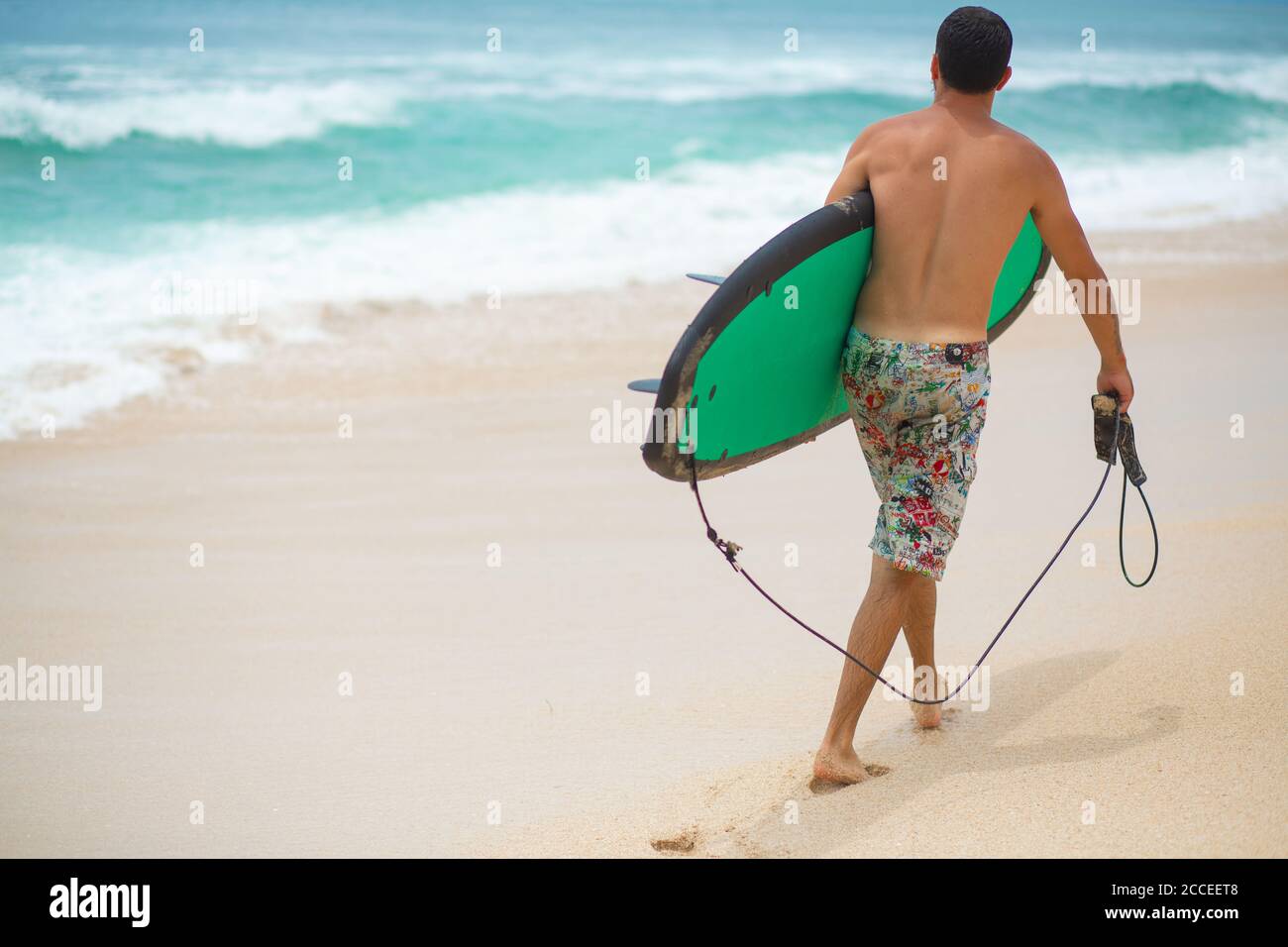 Surfer. Surfing Man With Surfboard Walking On Sandy tropical Beach ...