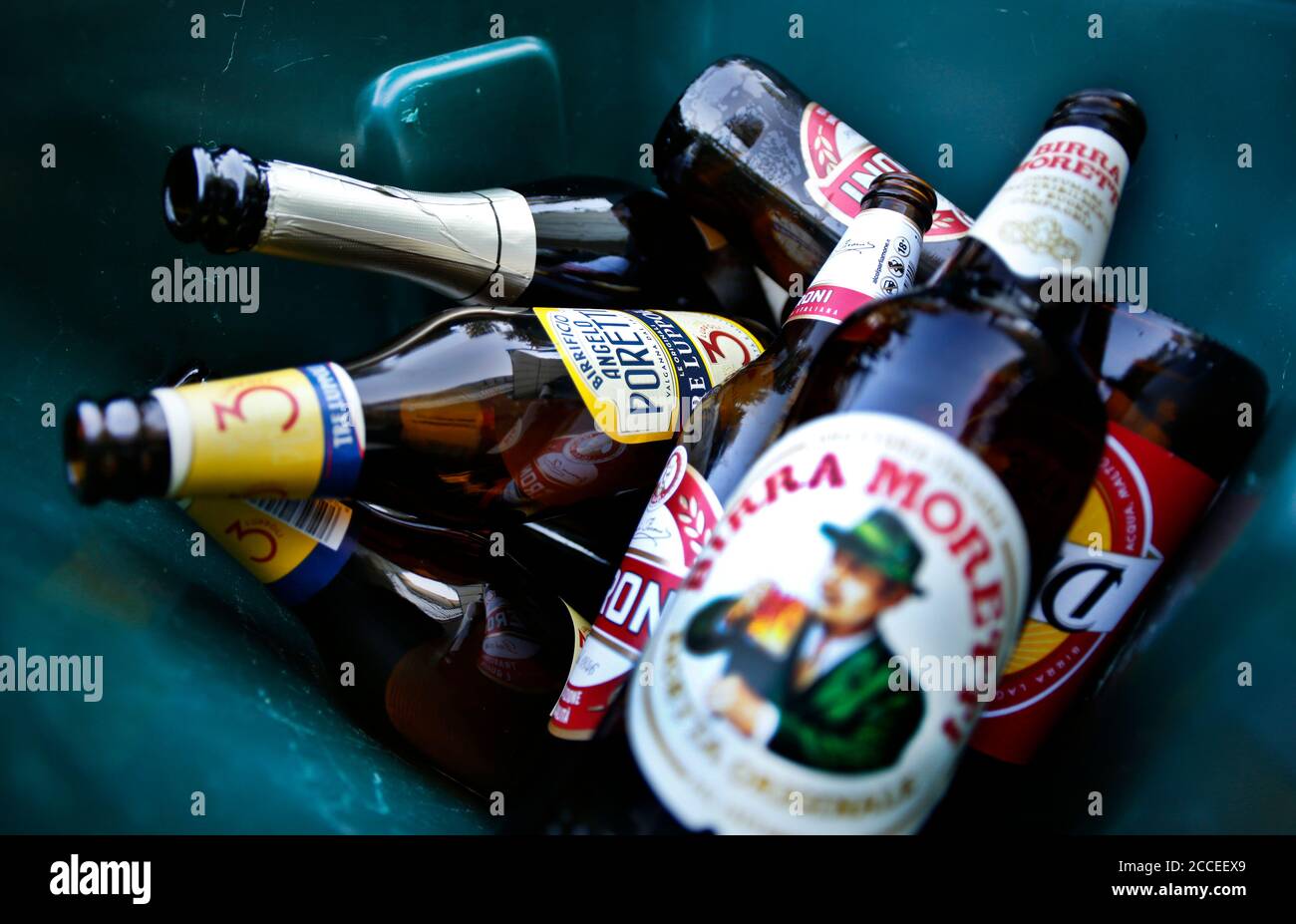 Empty Italian beer bottles in a recycling bin in Italy Stock Photo Alamy