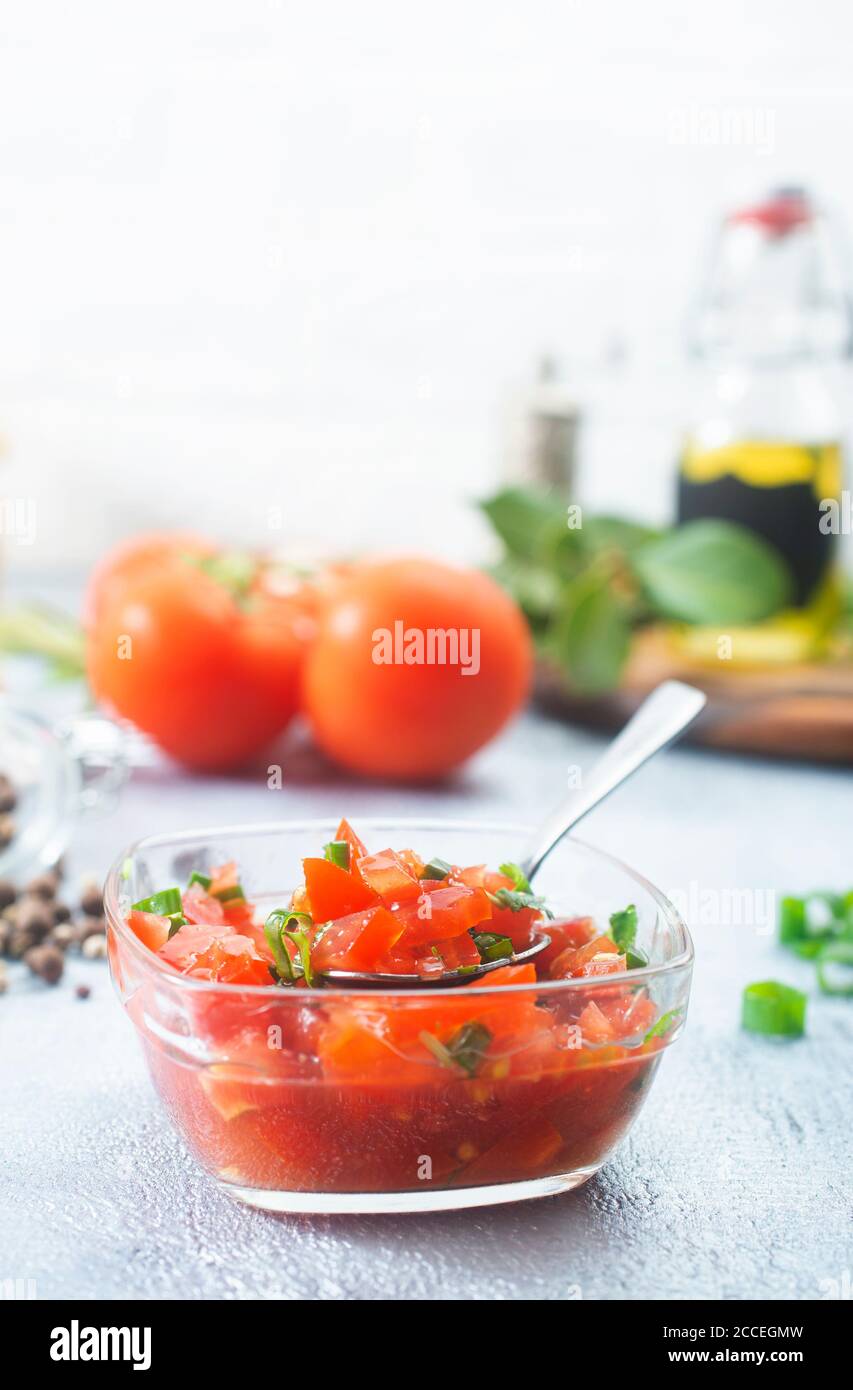 Tomato salsa, traditional mexican sauce with ingredients for making