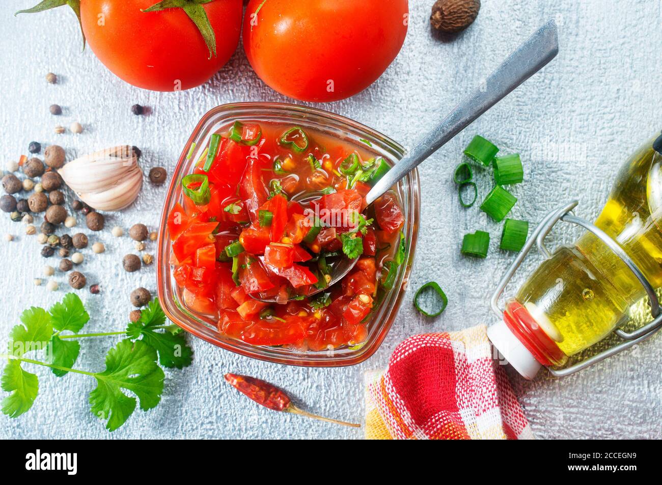 Tomato salsa, traditional mexican sauce with ingredients for making