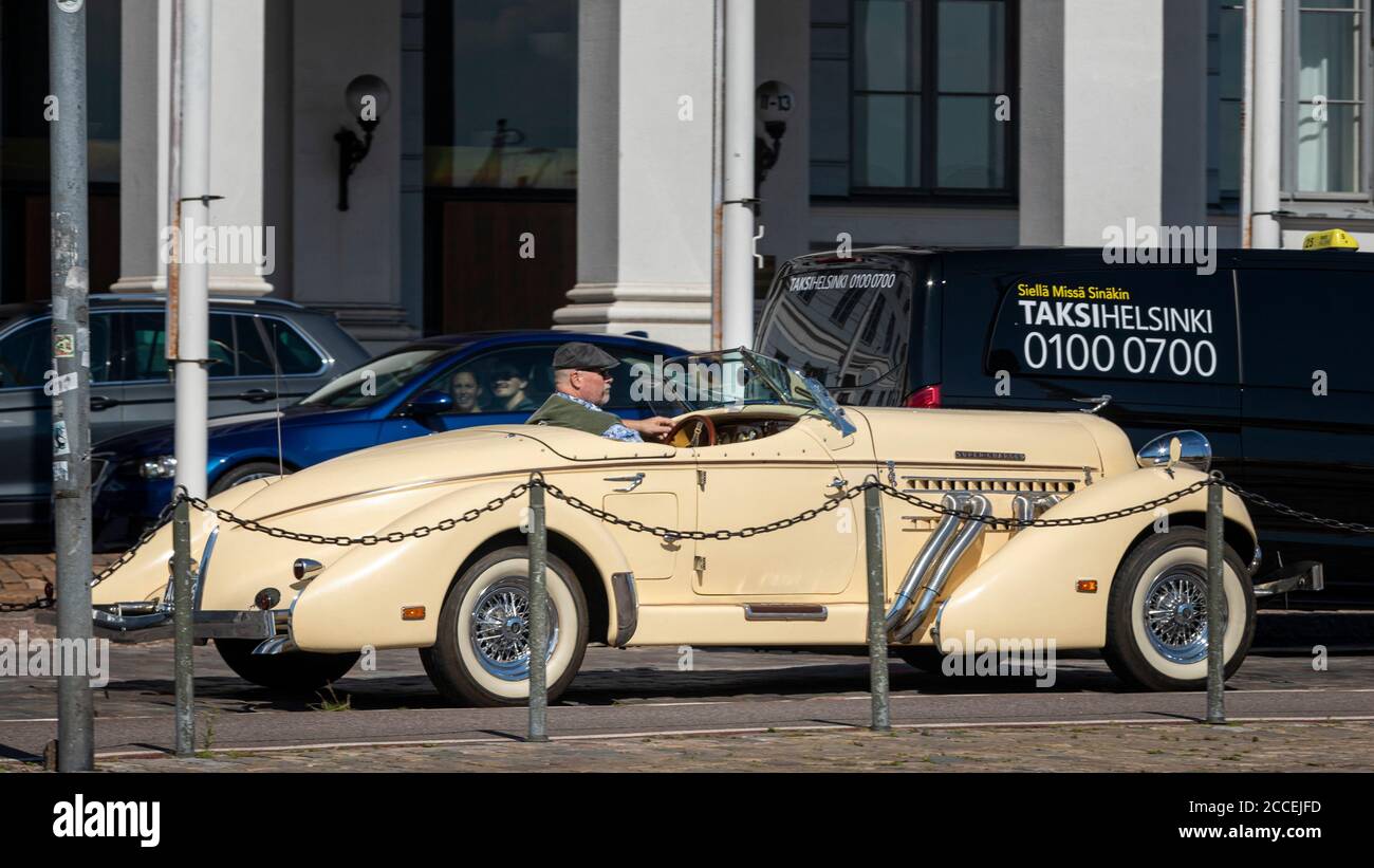 Auburn Speedster replica vintage car driving on streets of Helsinki. Original cars were manufactured in early 20th century and are really rare. Stock Photo