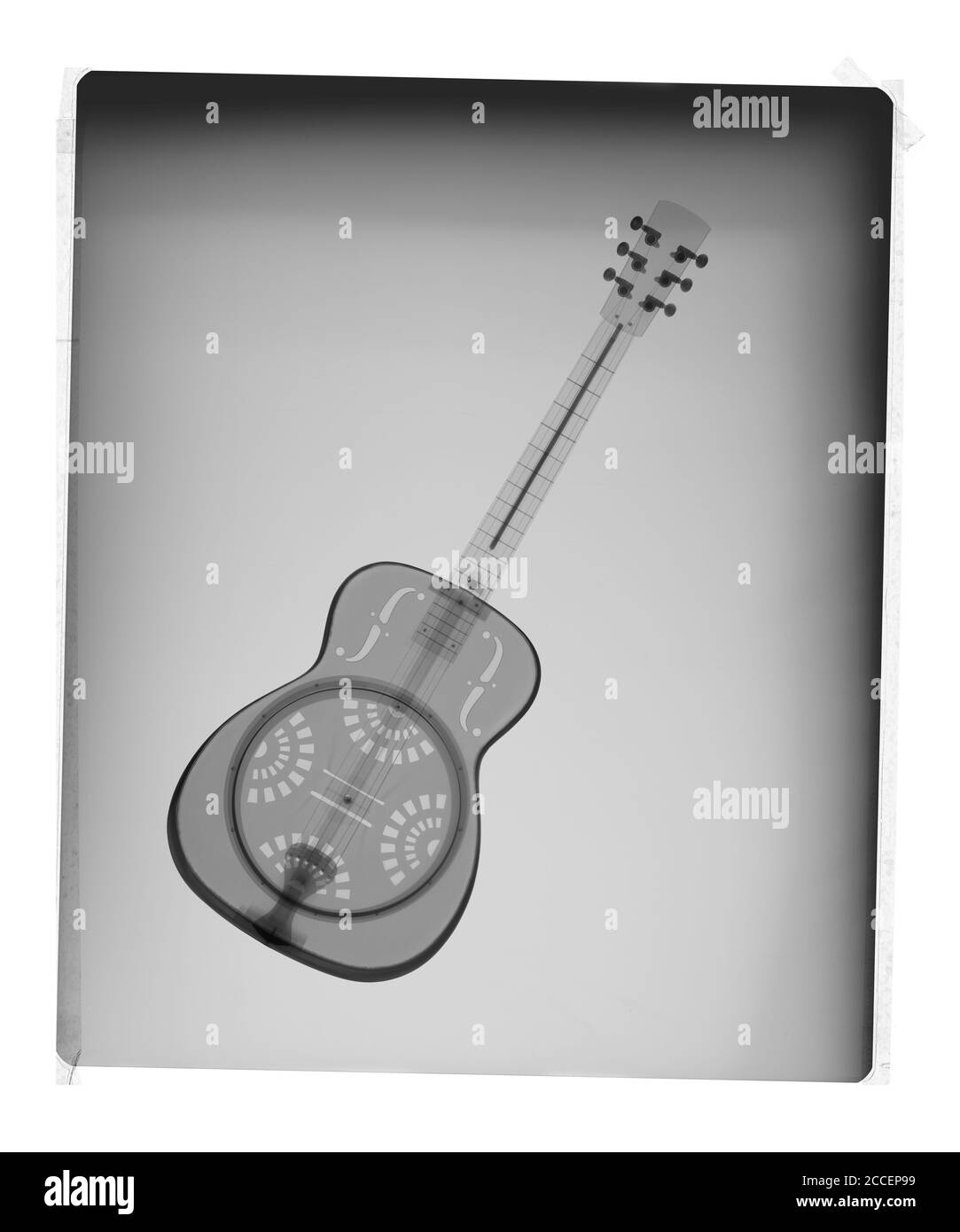 Acoustic guitar on film, X-ray Stock Photo