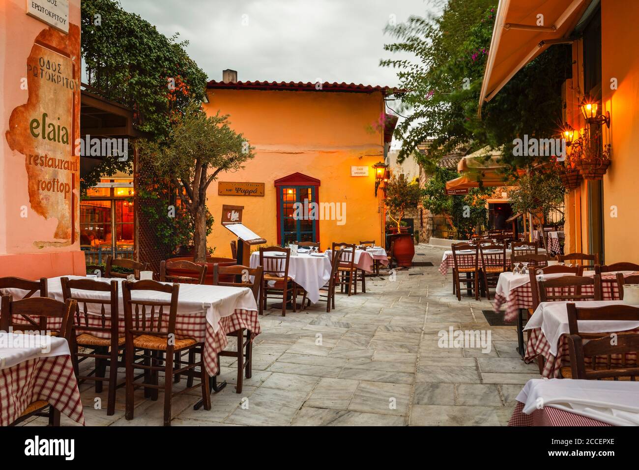 Athens, Greece - September 25, 2018: Taverna in a street of Plaka district in Athens, Greece. Stock Photo