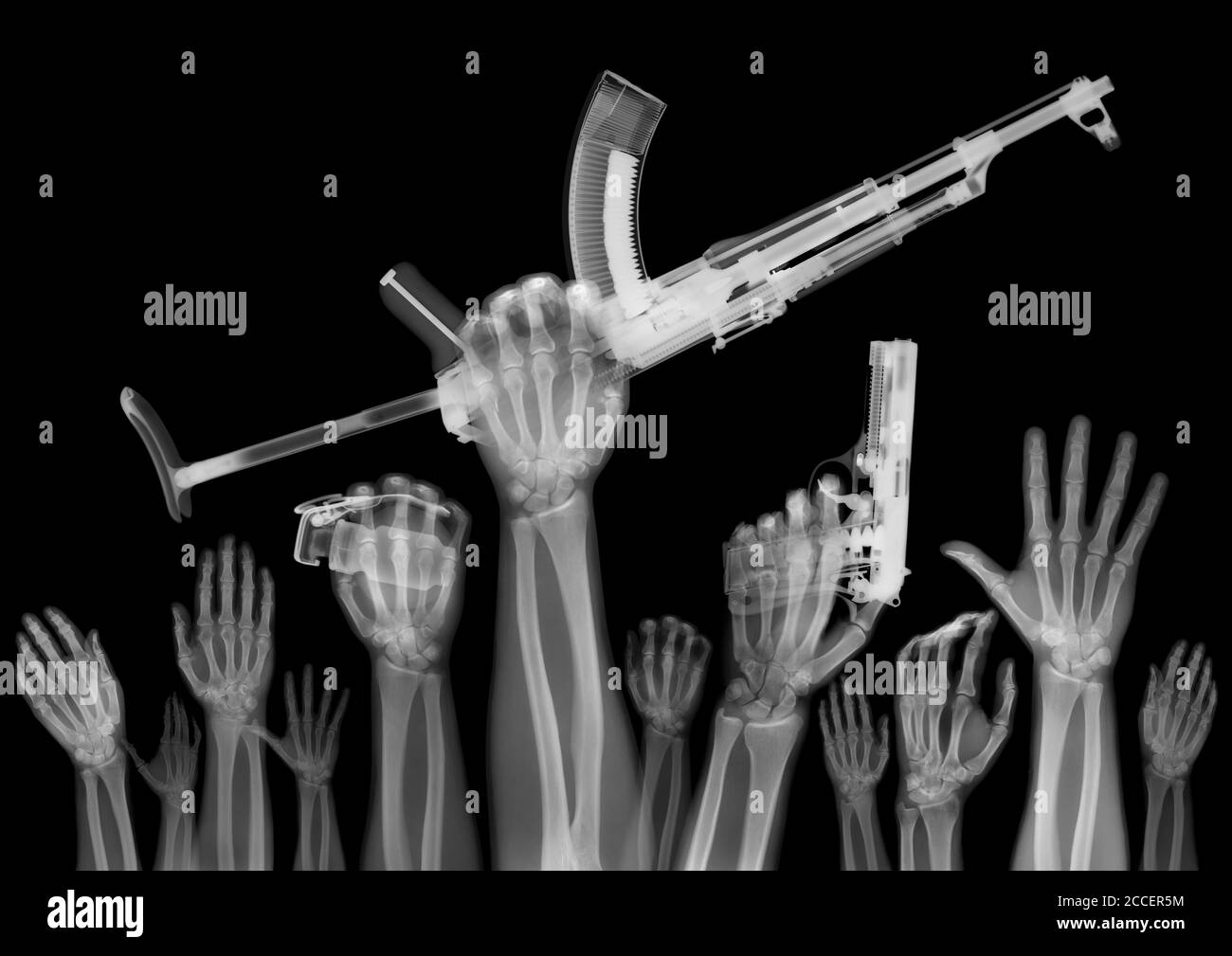Hands of protesters with guns, X-ray Stock Photo