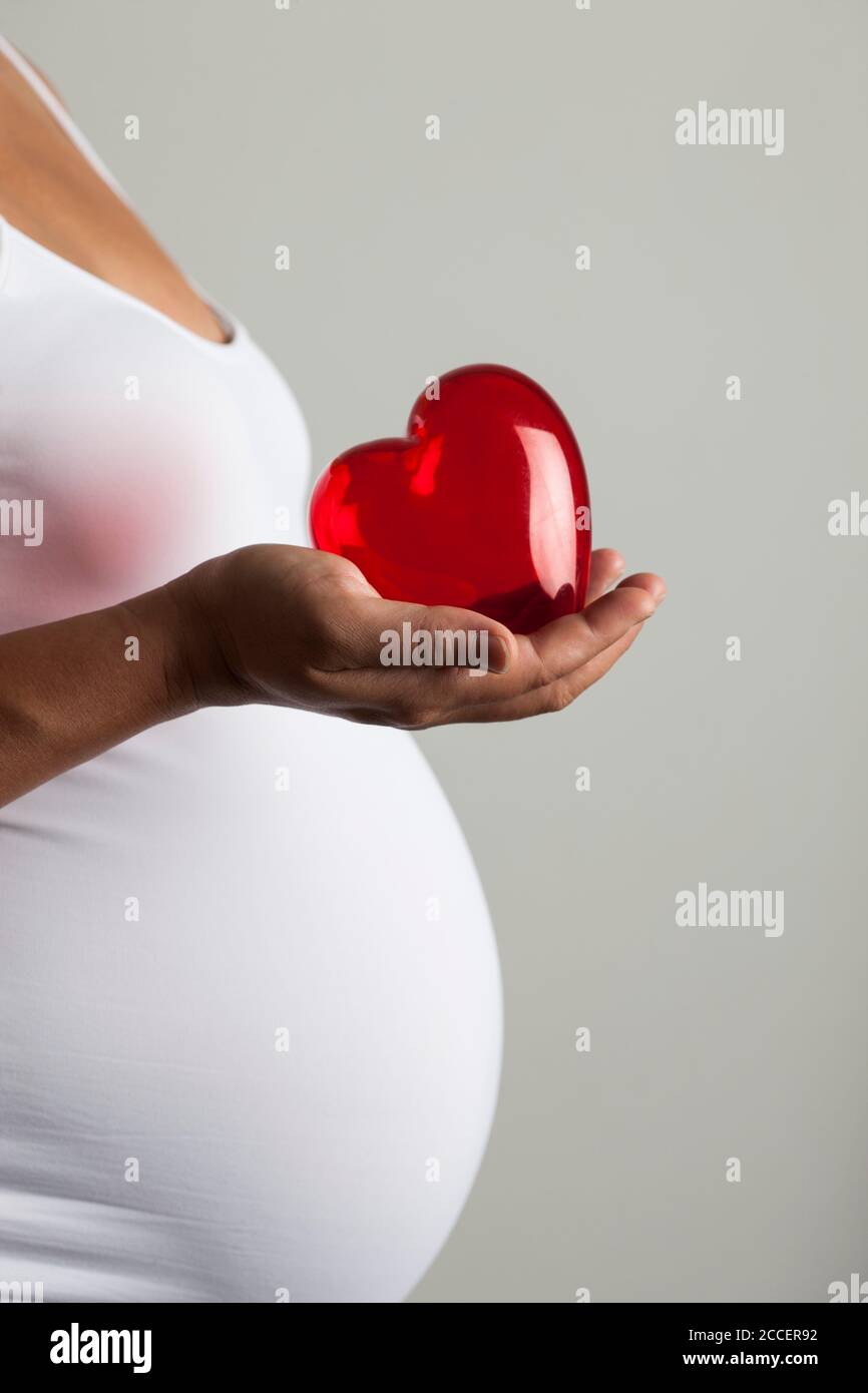 Maternal love, conceptual image Stock Photo