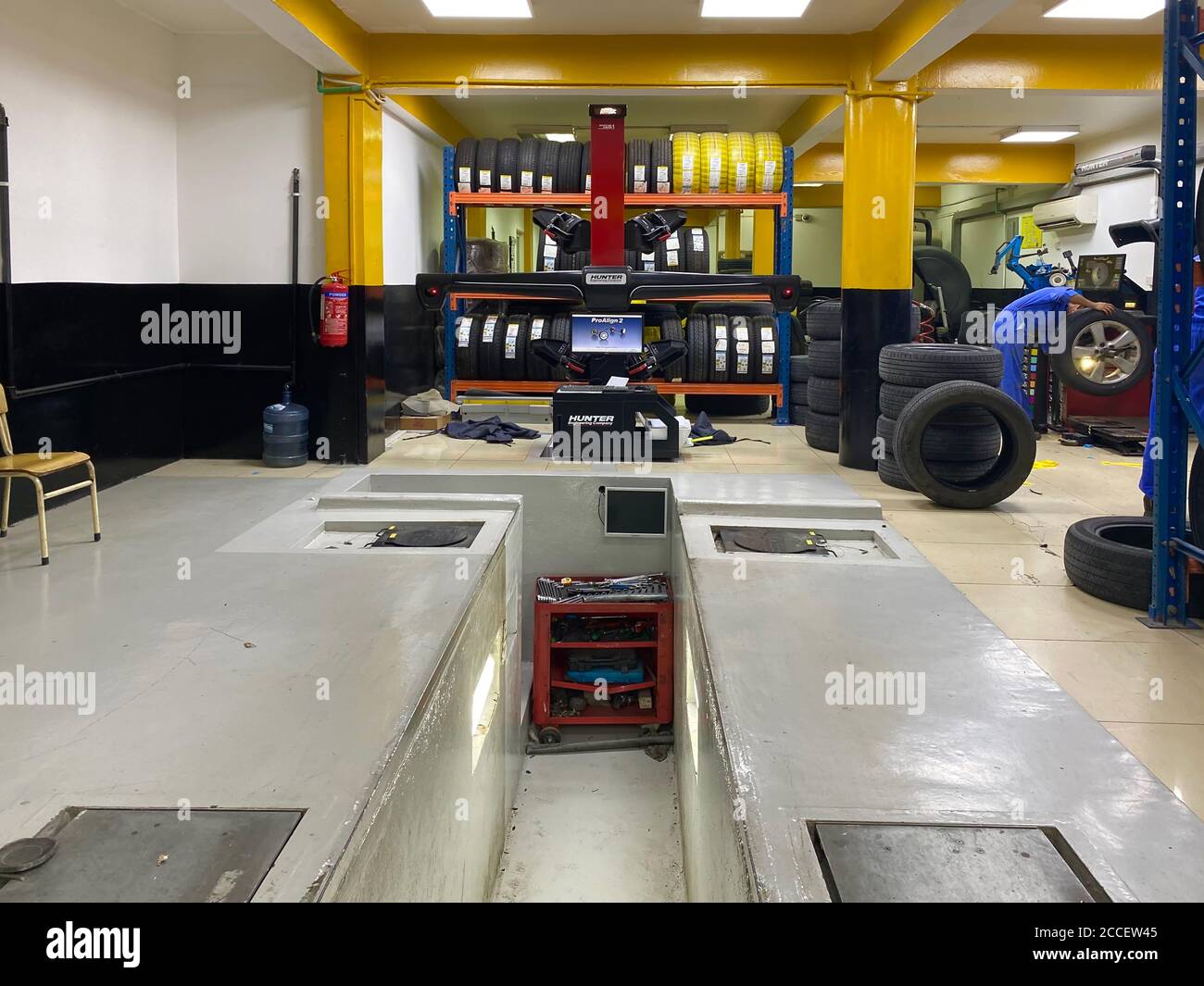 Wheel alignment equipment in a car repair station, Car Steering Wheel  Balancer Calibrate with laser reflector. Car concept Stock Photo - Alamy