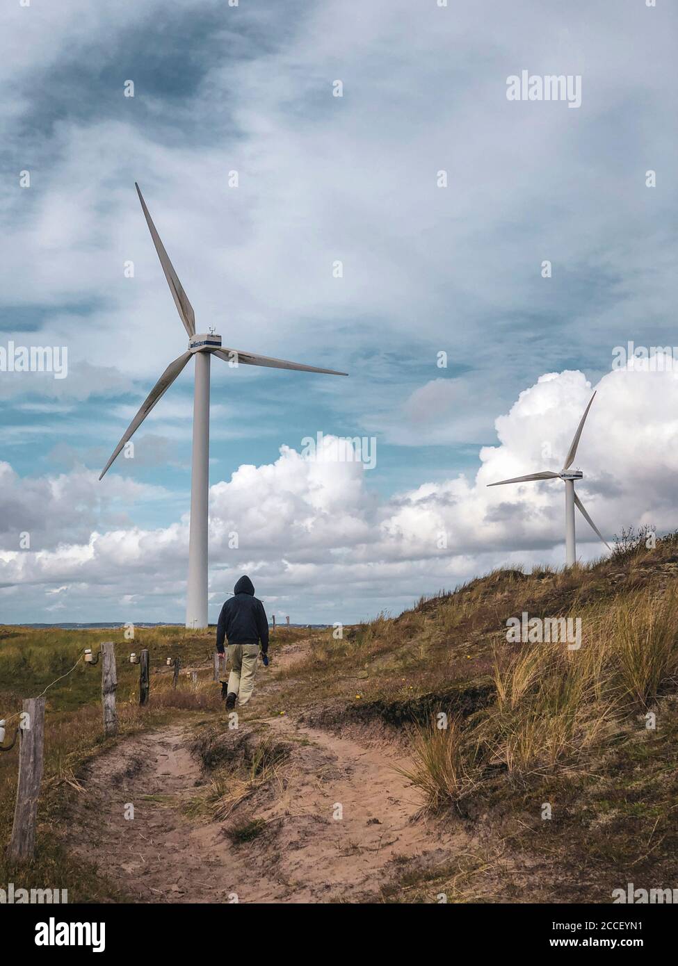 Deceleration, walk on the North Sea, wind turbines, Denmark Stock Photo