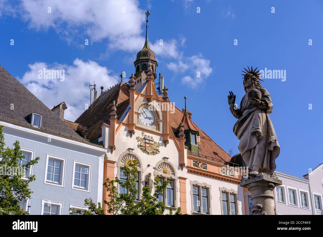 Statue of the Savior with globe on Fischerbrunnen and town hall, Braunau am Inn, Innviertel, Upper Austria, Austria Stock Photo