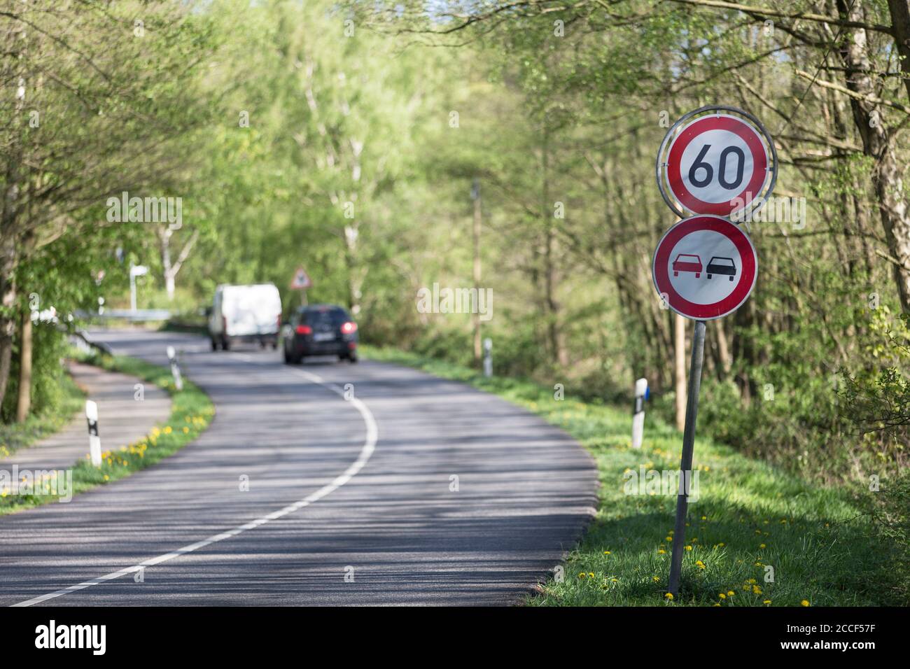 Tempo zone 60 on a country road, Germany Stock Photo