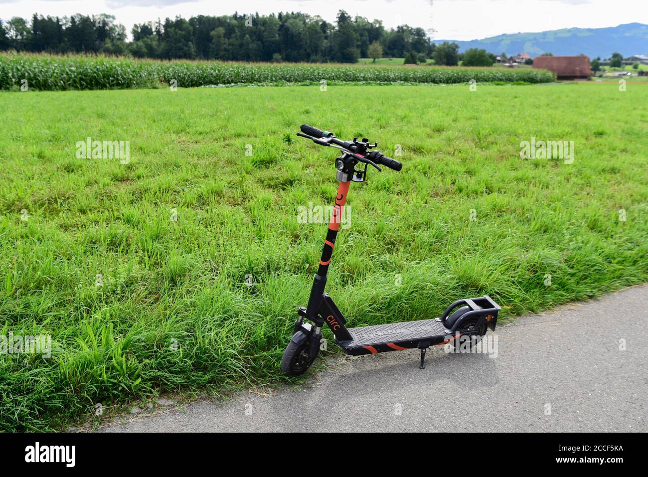 Circ flash e-scooter stands abandoned on the roadside, Cham, Switzerland Stock Photo