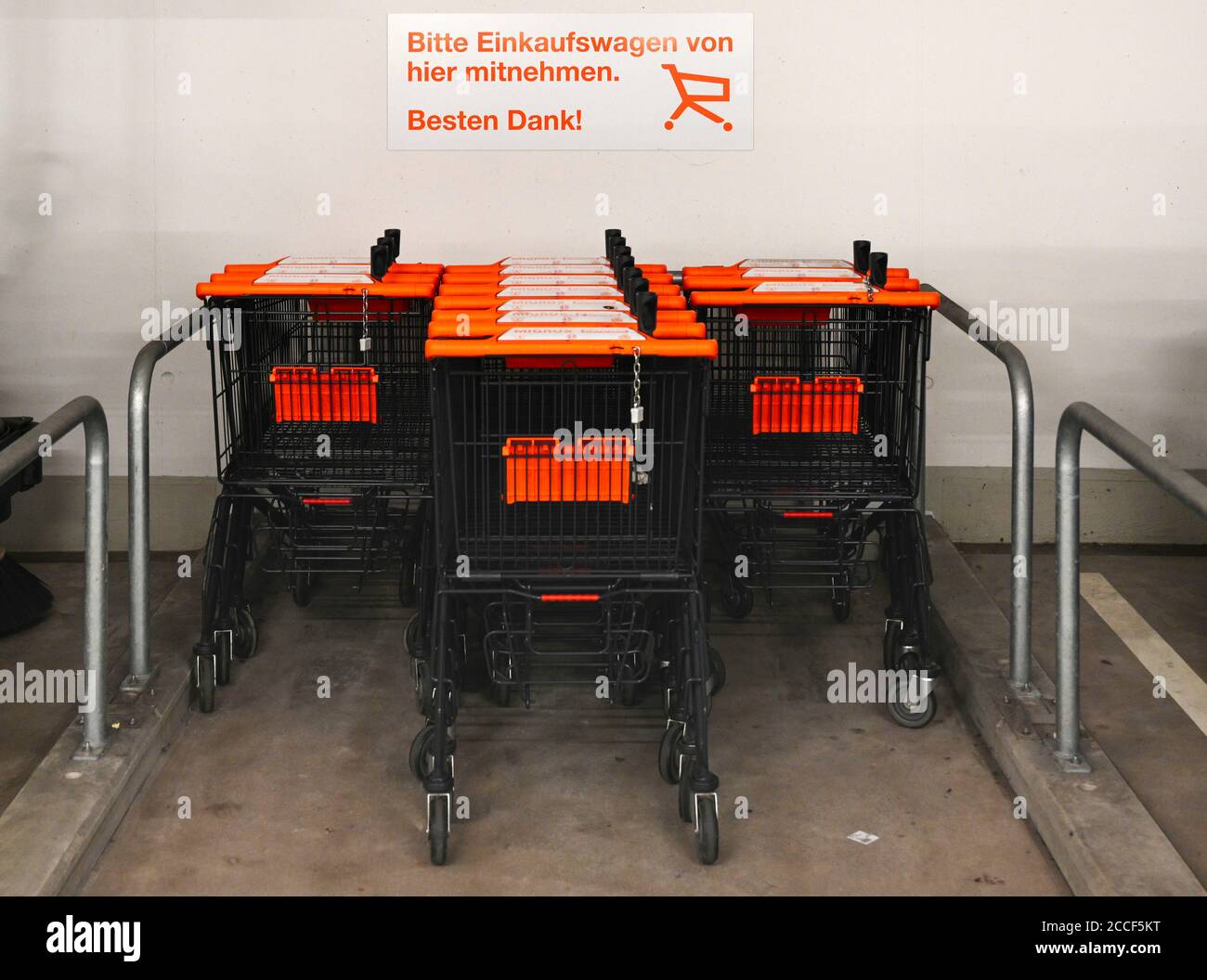 Migros and Denner shopping trolleys, Ebikon, Switzerland Stock Photo