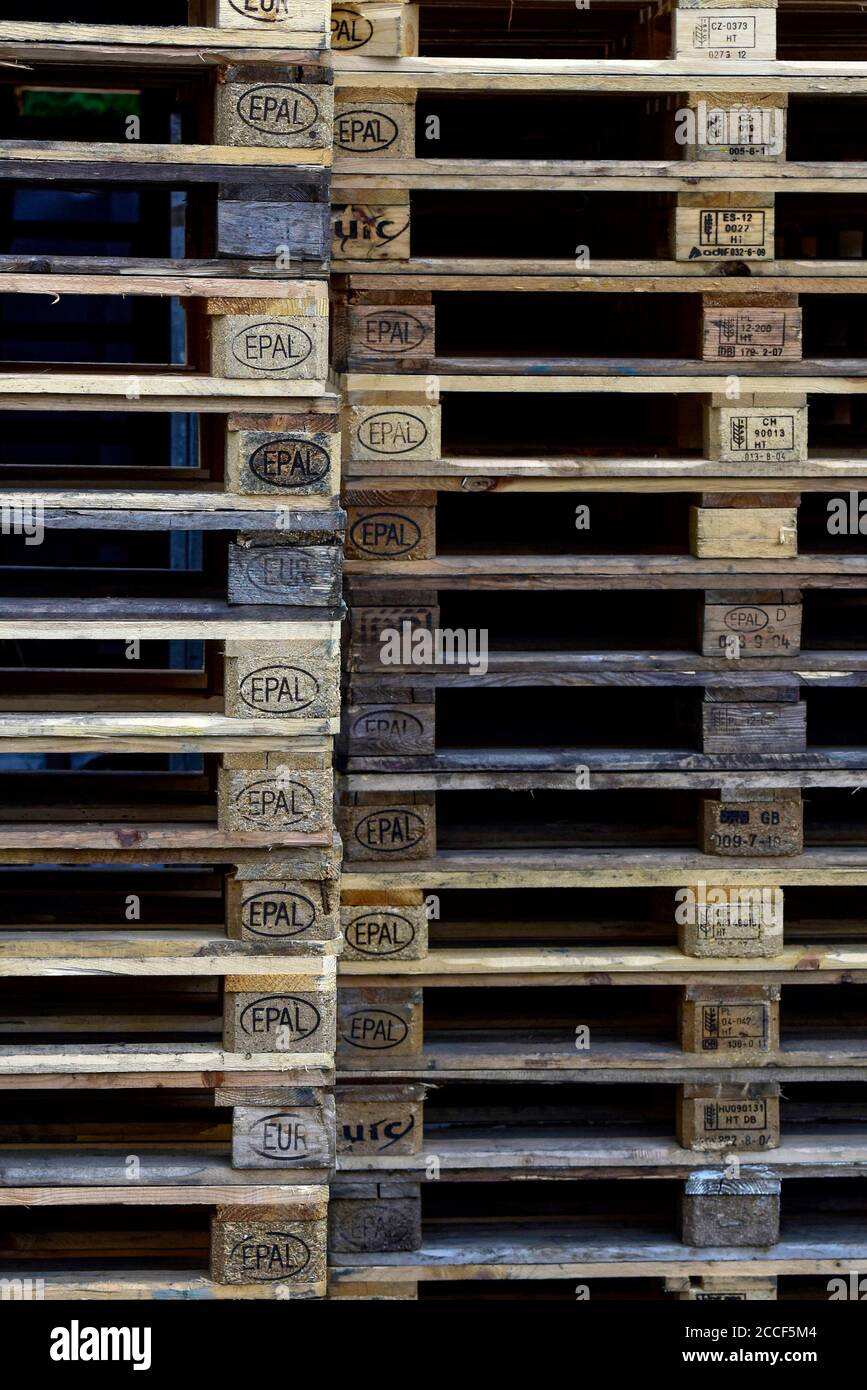 Stacked Euro pallets with EPAL and EUR signs Stock Photo Alamy