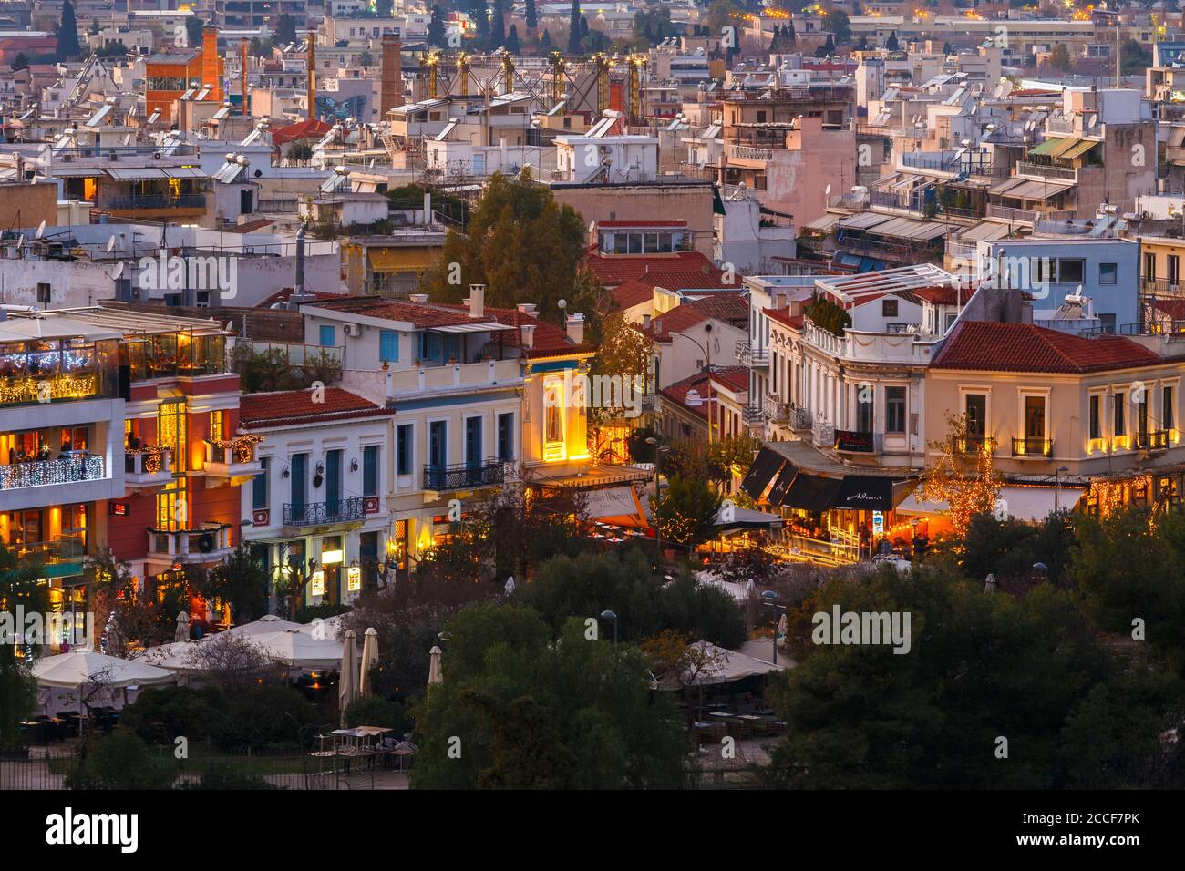 View of Thissio quarters in Athens from Areopagus hill at sunset. Stock Photo