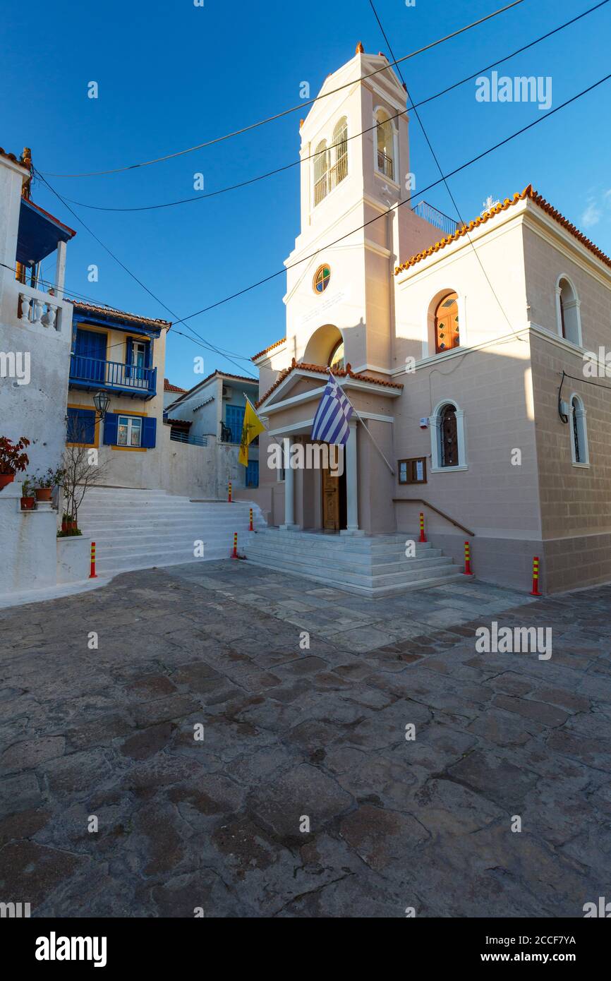 Church and a small square in Chora village of Poros island in Greece. Stock Photo