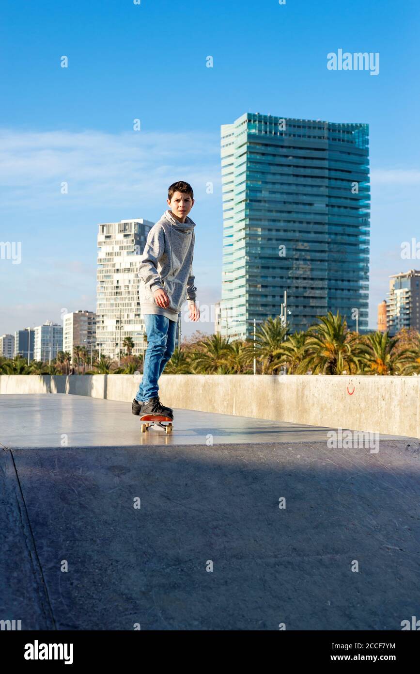 Young skater teen riding on skate ramp Stock Photo - Alamy