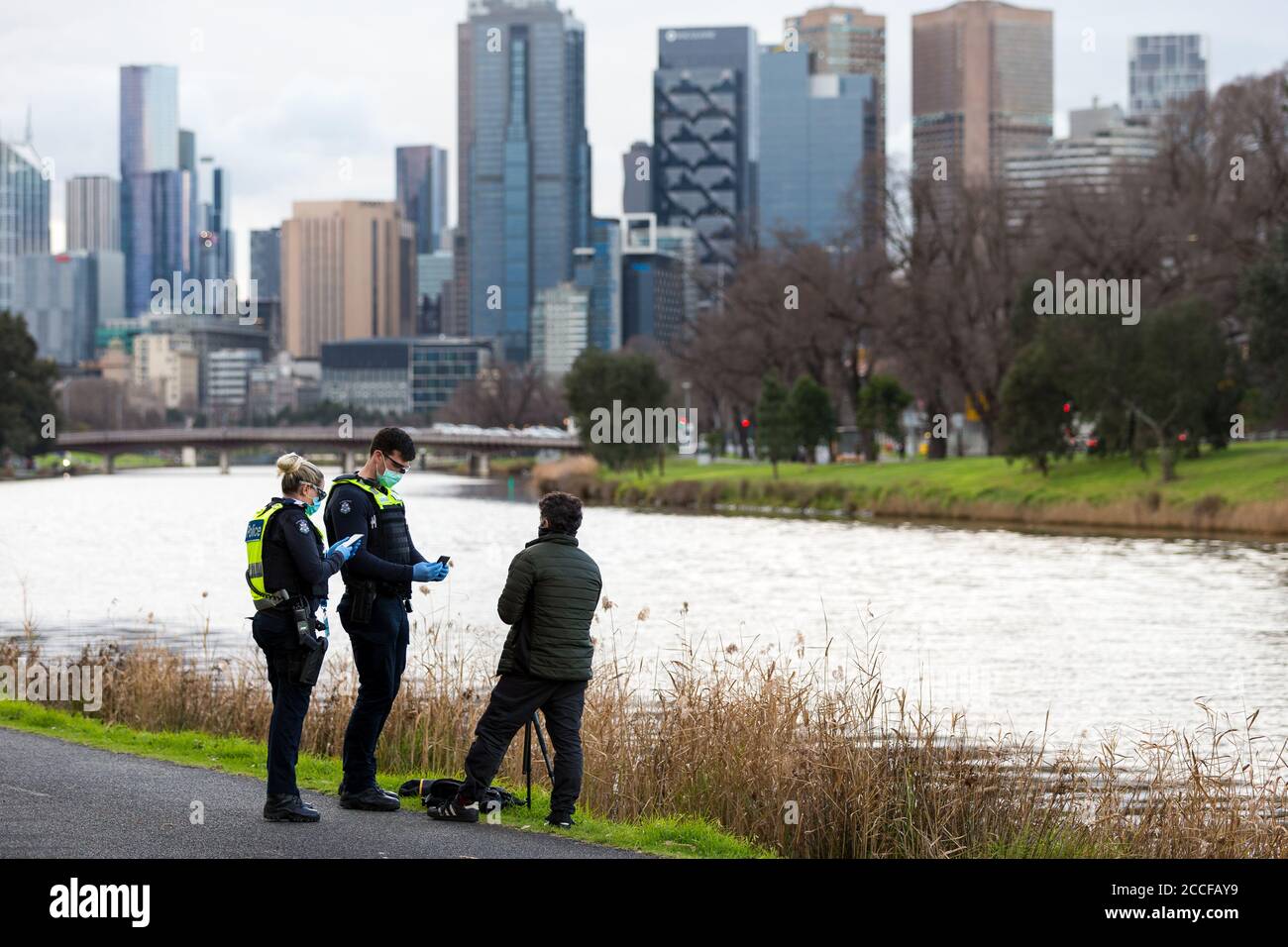 A photographer is fined by police for leaving his home for an unlawful reason during COVID19 in