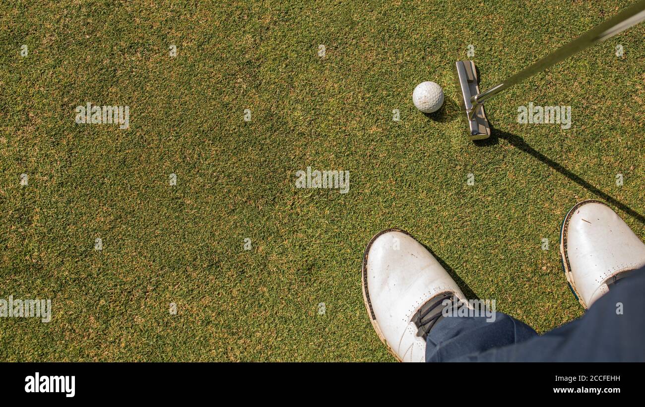 A person playing golf. High quality photo Stock Photo