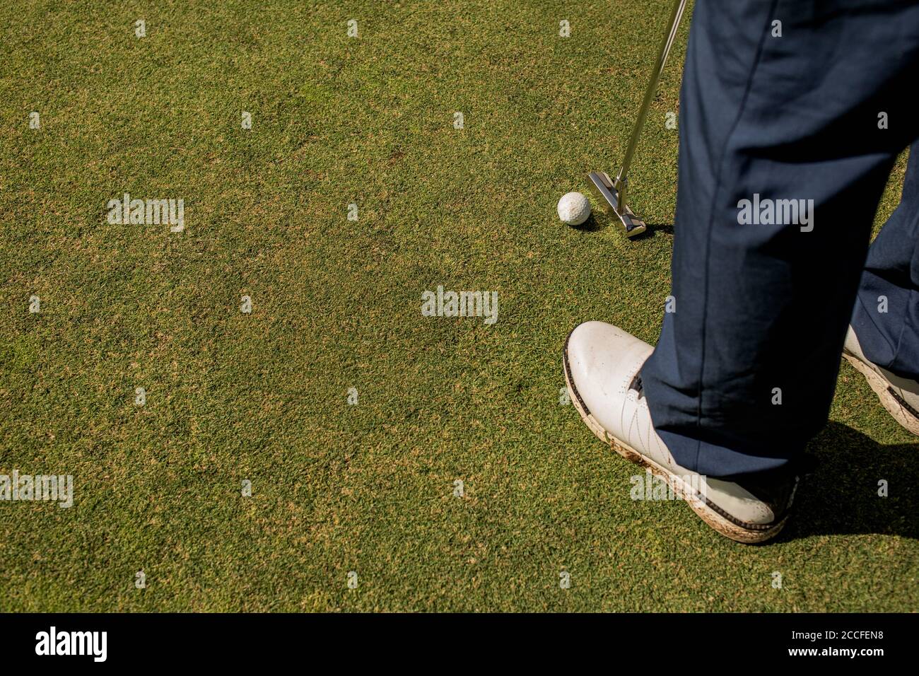 A person playing golf. High quality photo Stock Photo