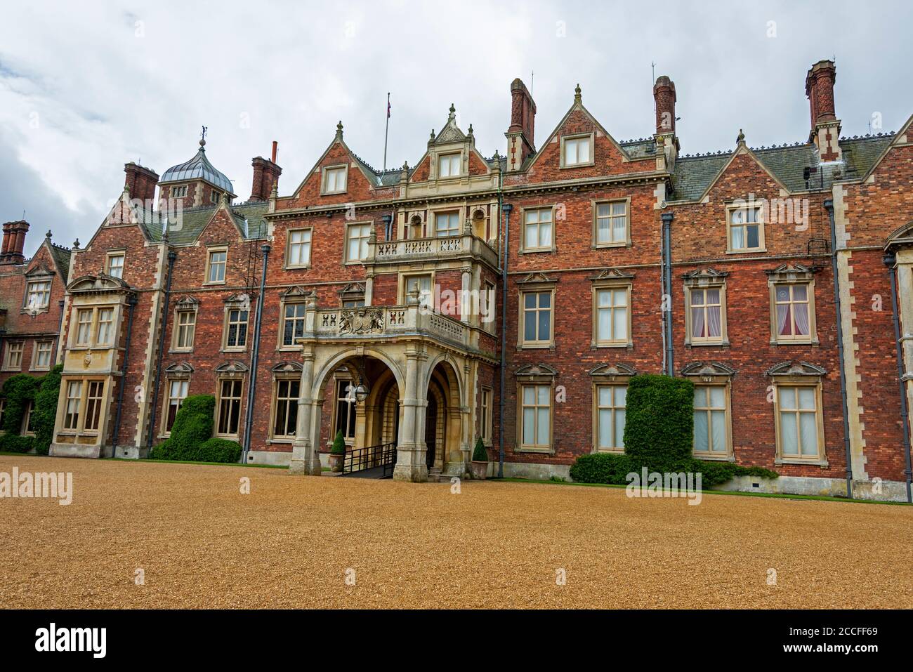 The main frontage of Sandringham House, a Grade II* listed Victorian built country house set in 20,000 acres of land near the village of Sandringham i Stock Photo