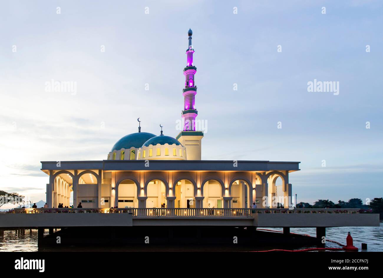 Floating mosque on the banks of the Sarawak River at dusk, Kuching, Sarawak, Borneo, Malaysia Stock Photo