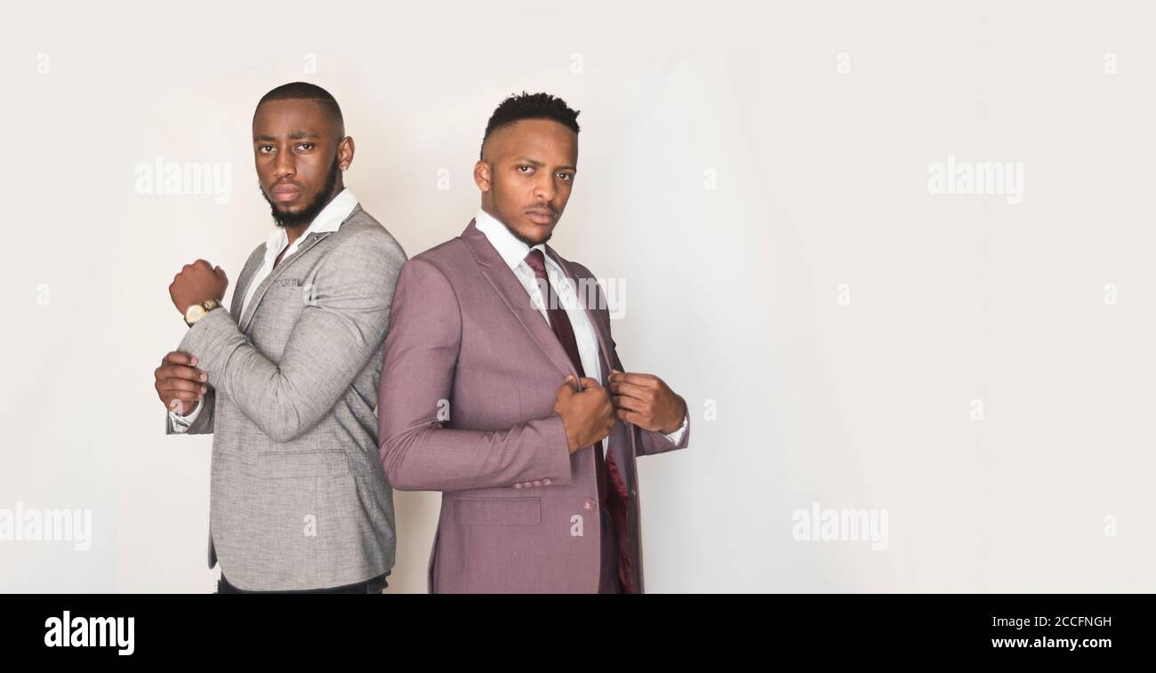 african stock photo of black gentlemen in smart clothes in studio setting Stock Photo