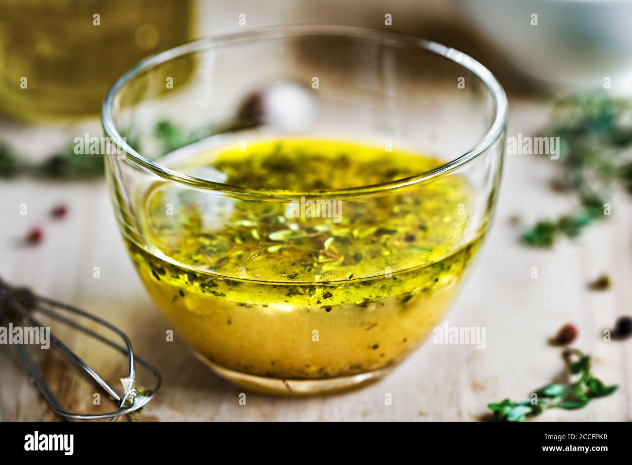Homemade Thyme salad dressing in a bowl Stock Photo Alamy