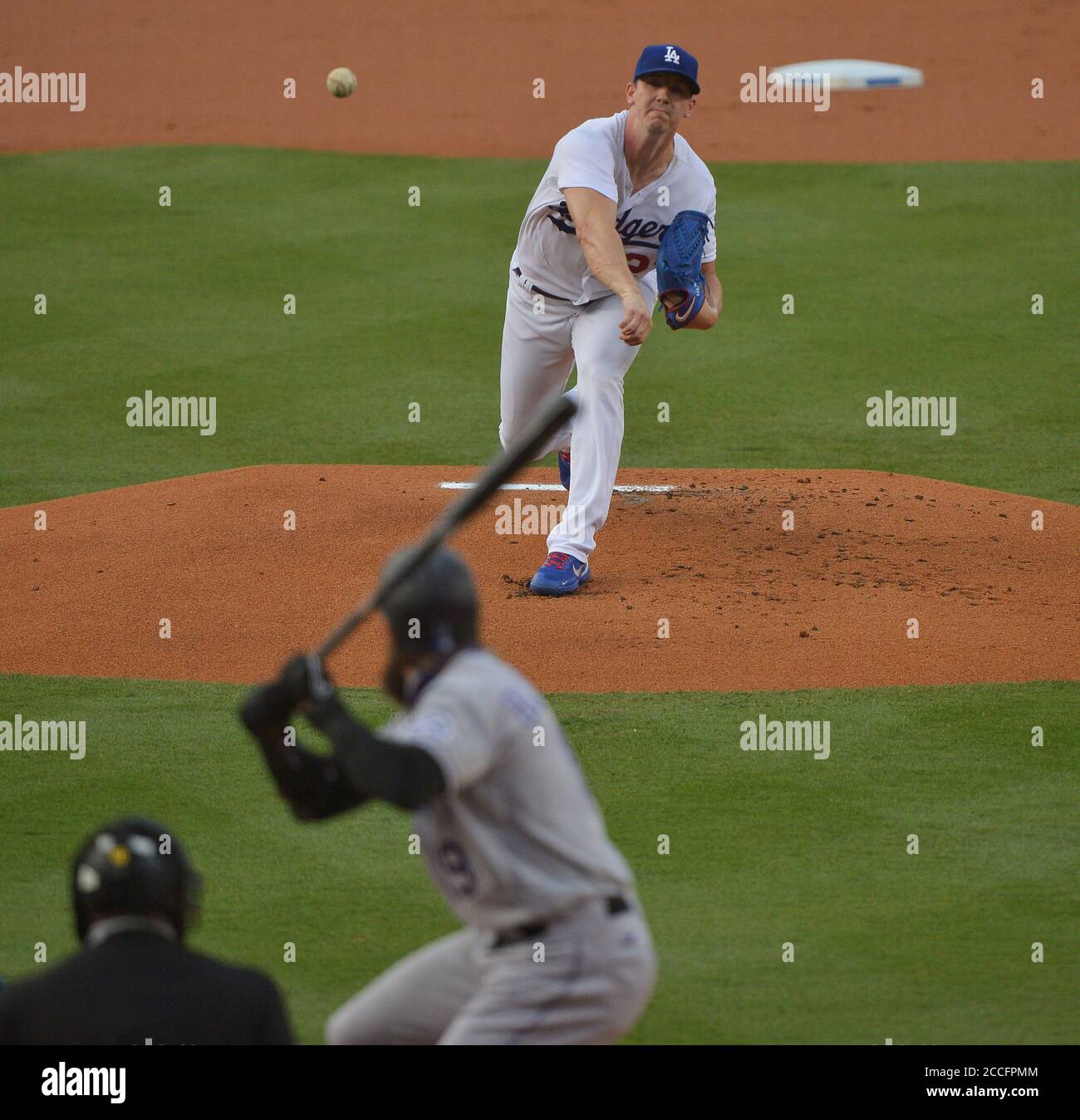 Los Angeles, United States. 21st Aug, 2020. Los Angeles Dodgers' Dodgers starting pitcher Walker Buehler delivers a pitch to Colorado Rockies' Charlie Blackmon in the third inning at Dodger Stadium in Los Angeles on Friday, August 21, 2020. Photo by Jim Ruymen/UPI Credit: UPI/Alamy Live News Stock Photo