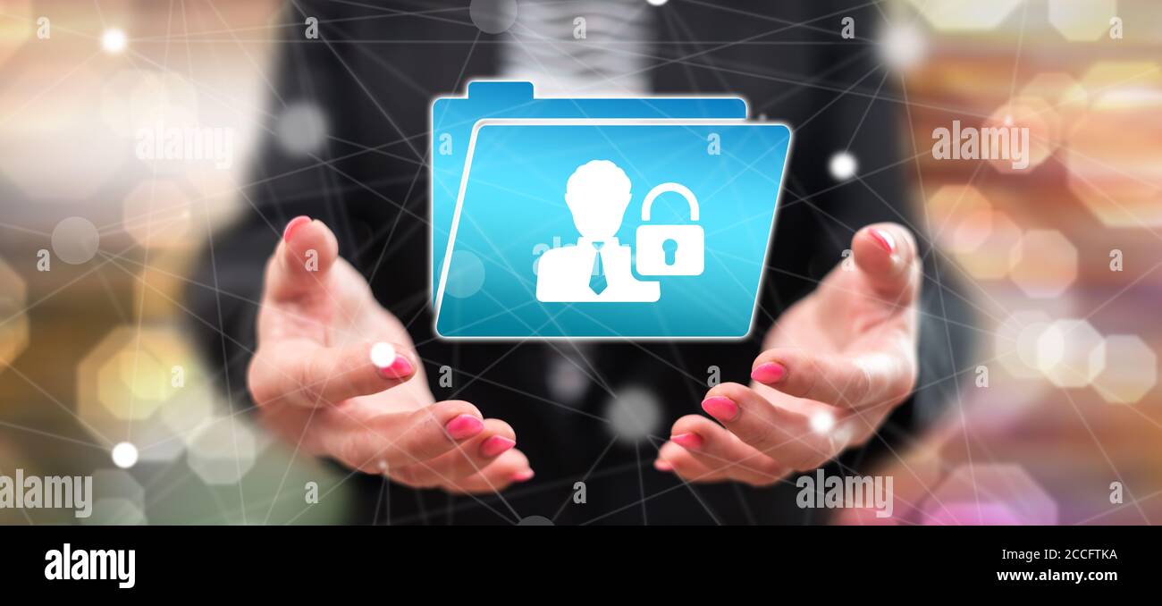 Personal data security concept above the hands of a woman in background ...