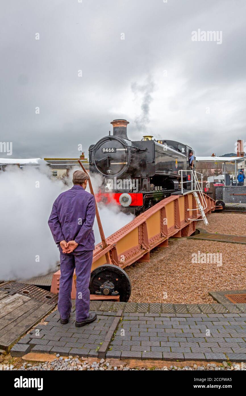 Ex-GWR 0-6-0 pannier tank steam loco 7714 on the turntable at Minehead station, West Somerset Railway Spring Gala event, England, UK Stock Photo