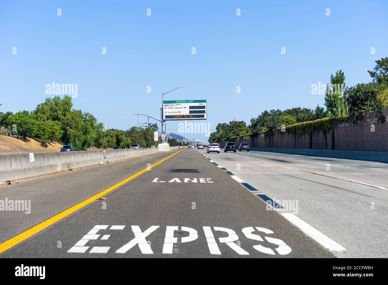 Aug 8, 2020 San Ramon / CA / USA - Designated express lane on a freeway in San Francisco Bay Area; Express lanes help manage lane capacity by allowing Stock Photo