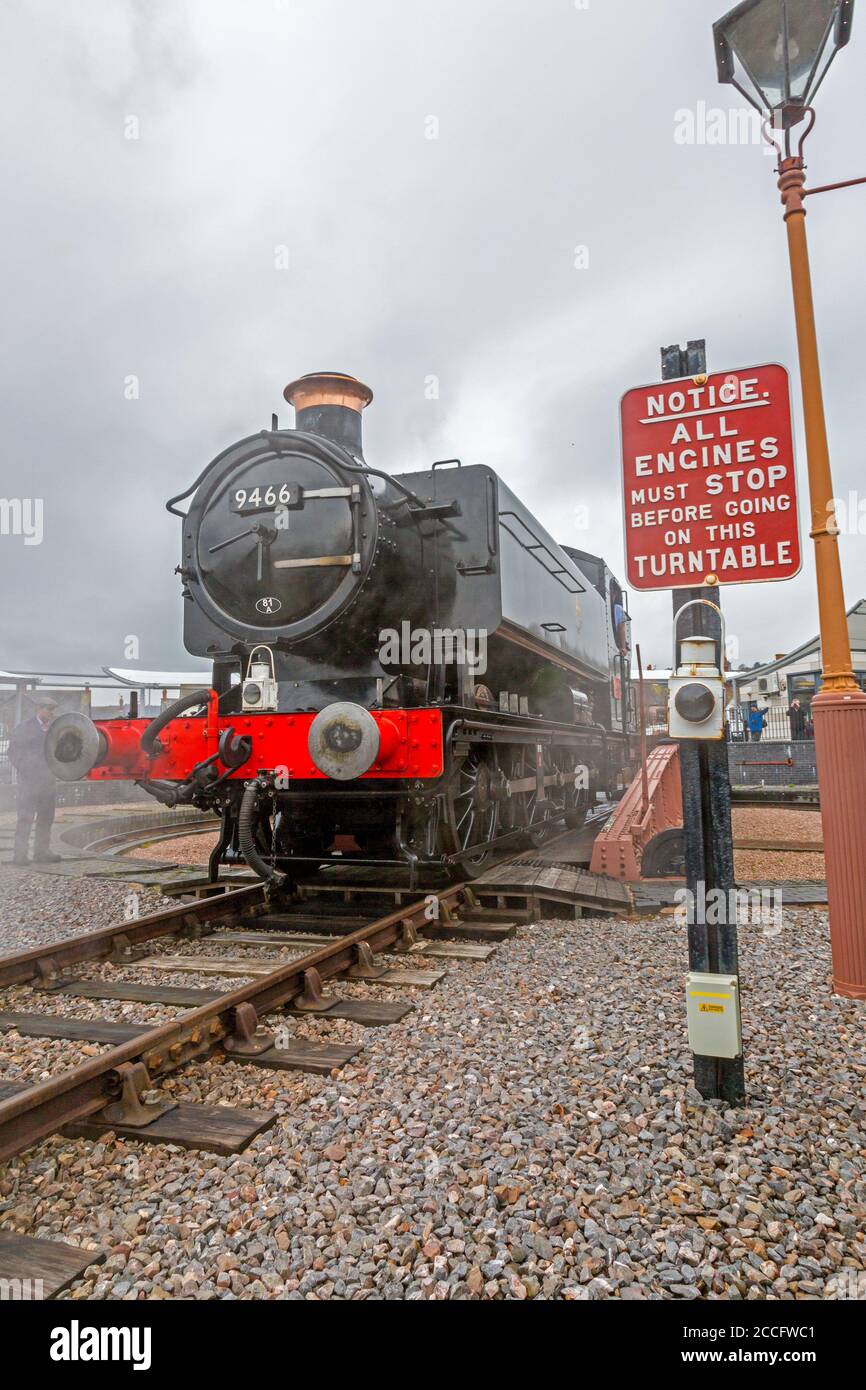 Ex-GWR 0-6-0 pannier tank steam loco 7714 on the turntable at Minehead station, West Somerset Railway Spring Gala event, England, UK Stock Photo