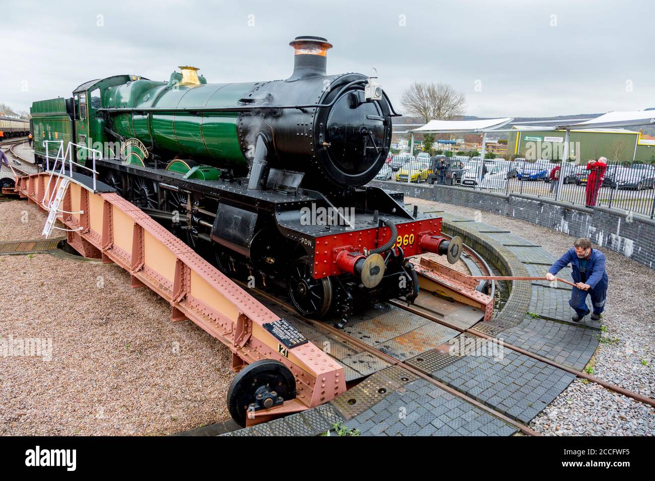 Ex-GWR steam loco 6960 'Raveningham Hall' on the turntable at Minehead, West Somerset Railway Spring Gala, England, UK Stock Photo