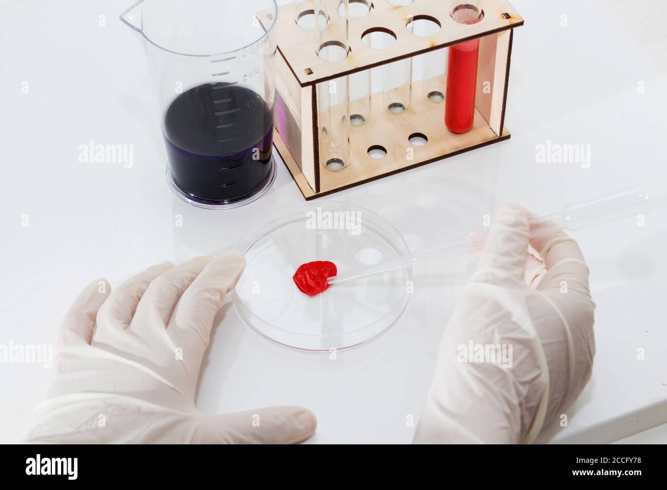 Lab tube, eppendorfs with red liquid. White background. Studio shot. Stock Photo