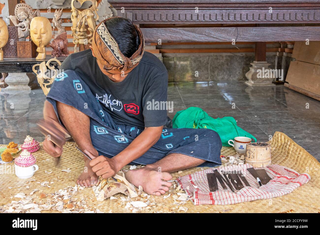 Balinese wood carving is a highly respected, traditional craft and the carvers are extremely talented producing thousands of items for the tourist ind Stock Photo