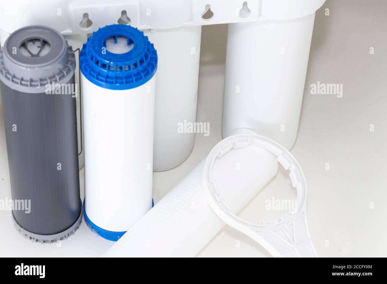 Replacing the water filter. Ecology. Clean water Stock Photo Alamy