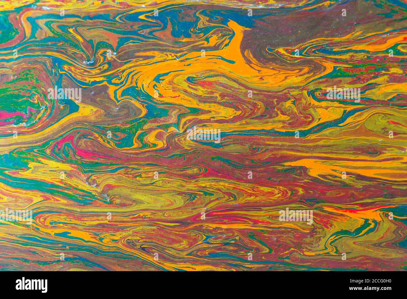 Liquid painting abstract texture. Colorful combination of bright colors. Stock Photo