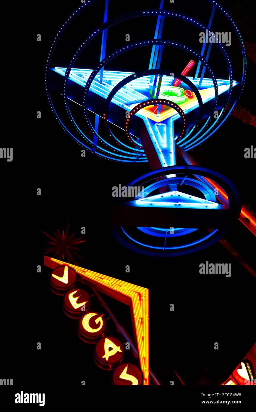 "Oscar's Neon Martini Glass" and Vegas giant neon sign on display above