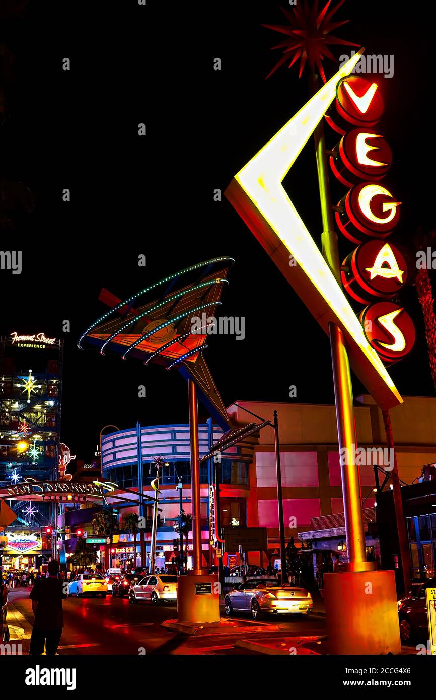 "Oscar's Neon Martini Glass" and Vegas giant neon sign on display above