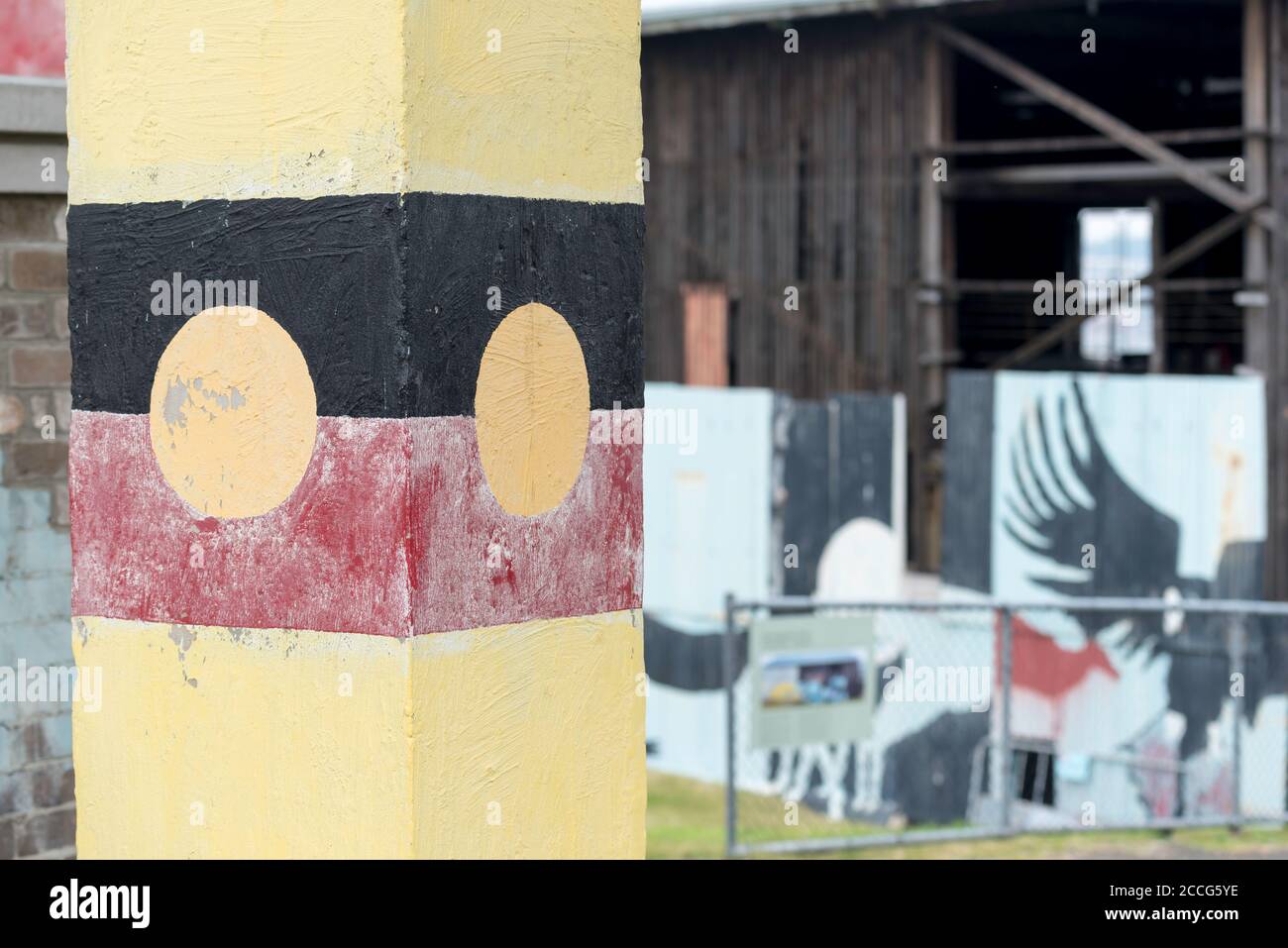 A painting of the Australian Aboriginal Flag, the officially designated and legislated flag of the Australian Aboriginal (First Nations) people. Stock Photo
