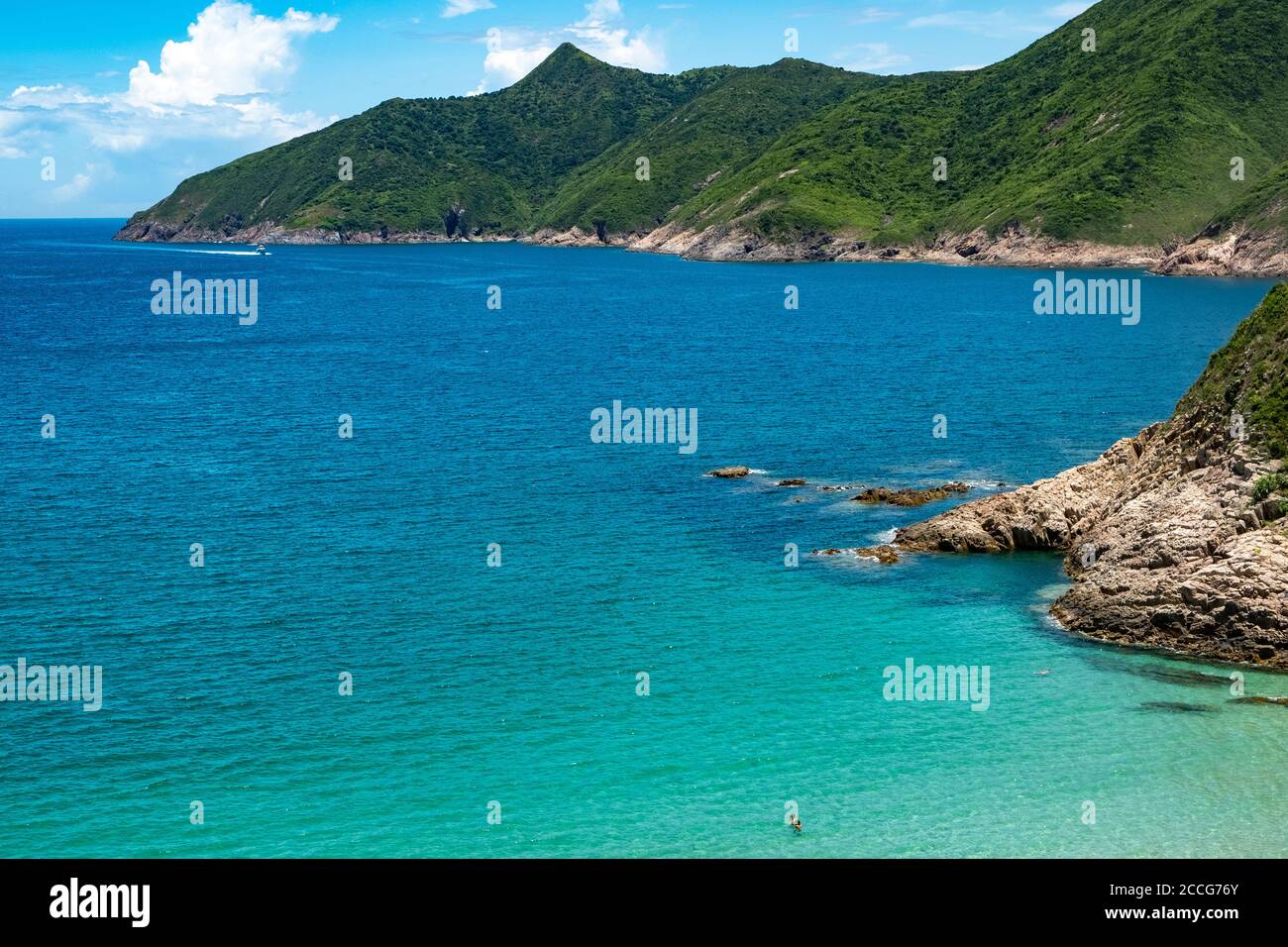 Crystal clear water on Ham Tin Wan beach in Eastern Sai Kung, Hong Kong. Stock Photo