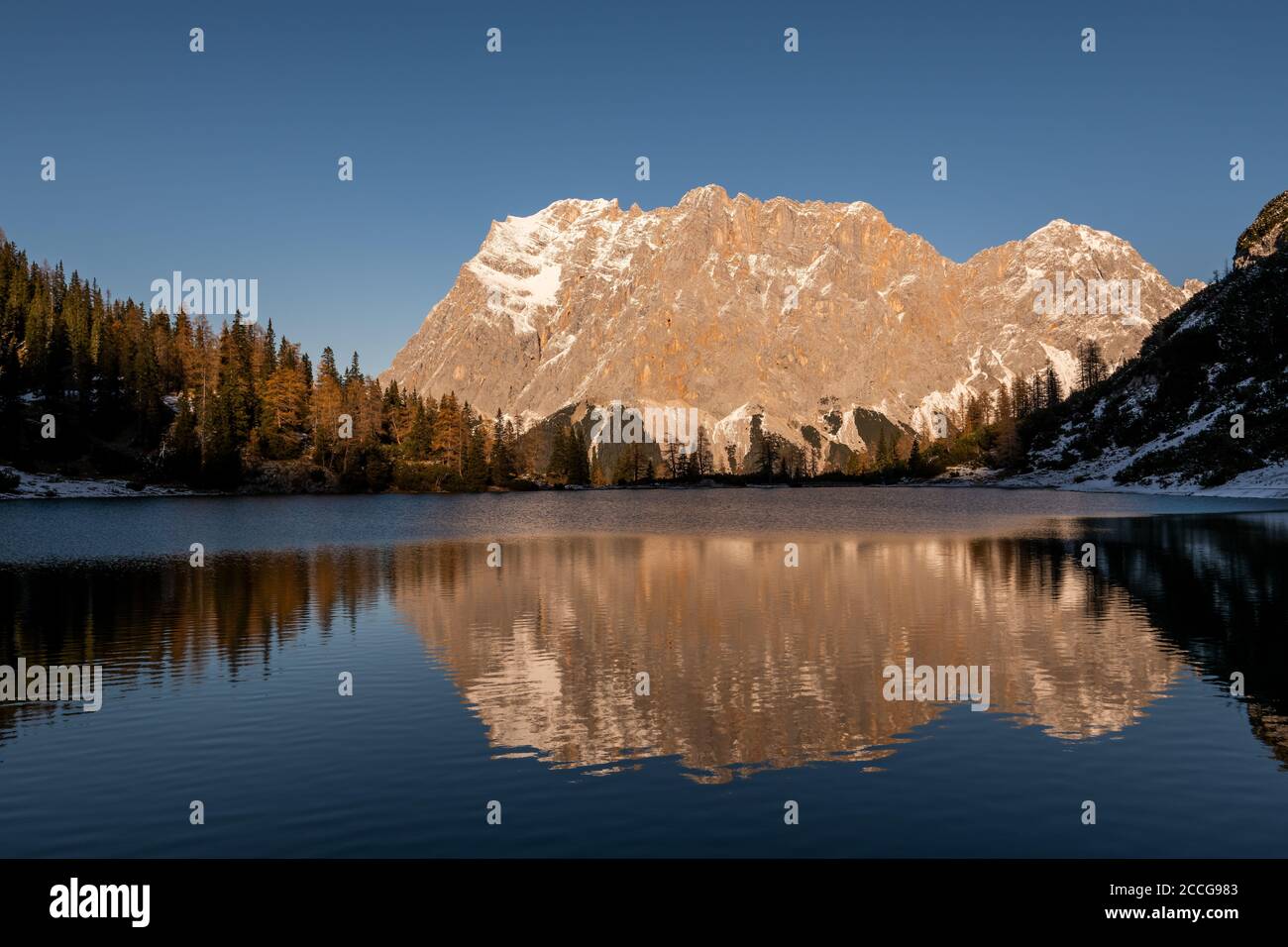 Zugspitze is reflected in the seebensee hi-res stock photography and ...