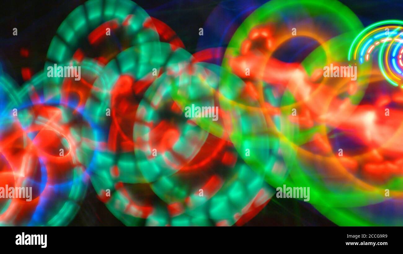 Abstract background with rhythmic colorful light trails and virtual ...