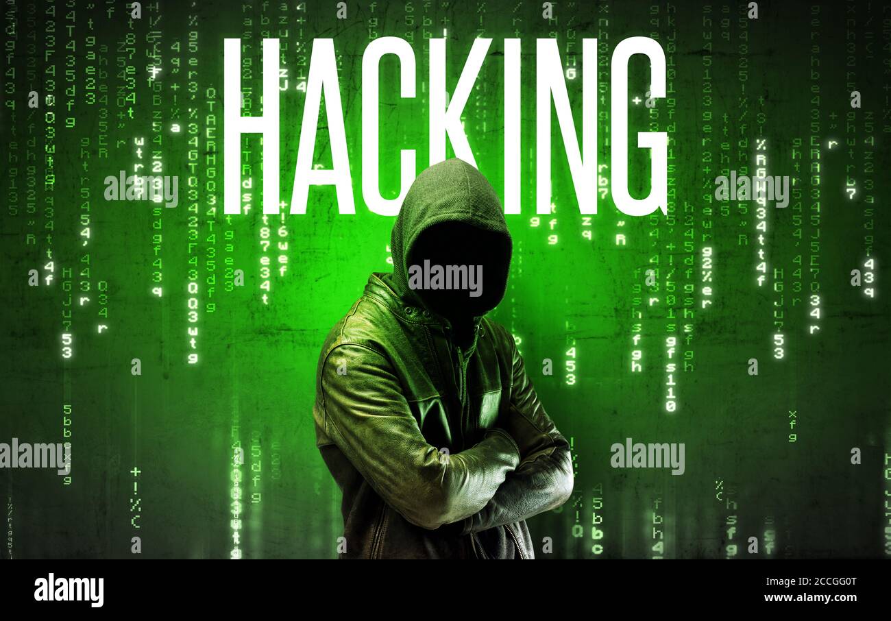 Faceless hacker with HACKING inscription, hacking concept Stock Photo
